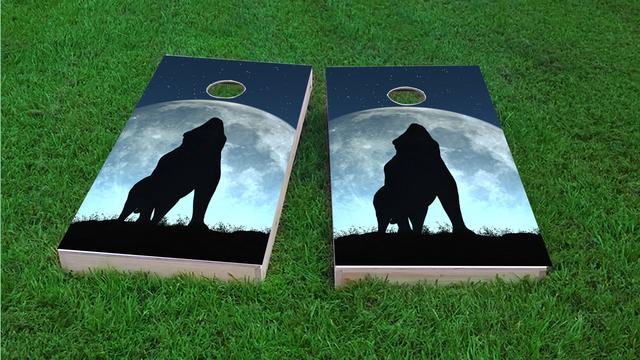 Wofl Howling to a Full Moon Themed Custom Cornhole Board Design