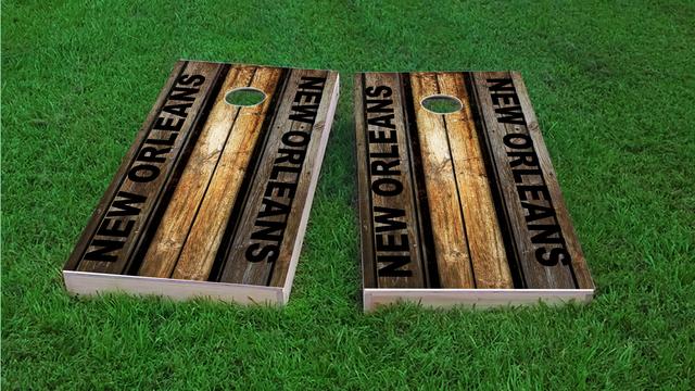 Woodslat Worn New Orleans Football Themed Custom Cornhole Board Design