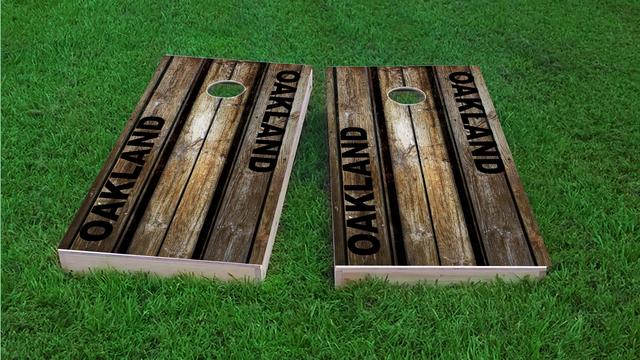 Woodslat Worn Oakland Football Themed Custom Cornhole Board Design