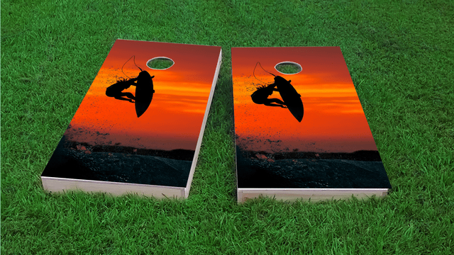 Surfer with Red Sky Themed Custom Cornhole Board Design