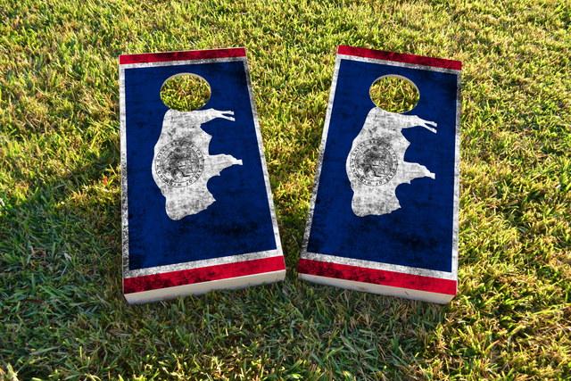 Worn State (Wyoming) Flag Themed Custom Cornhole Board Design