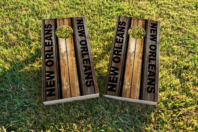 Woodslat Worn New Orleans Football Themed Custom Cornhole Board Design