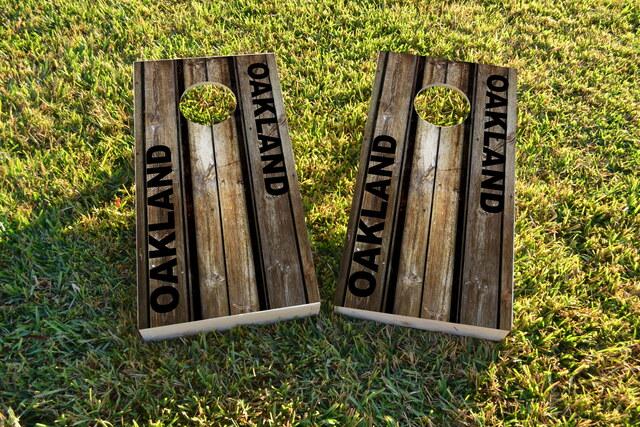 Woodslat Worn Oakland Football Themed Custom Cornhole Board Design