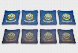 Idaho State Flag Set themed specialty custom cornhole bags featuring a standard and worn / distressed flag.