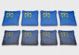 Nevada State Flag Set themed specialty custom cornhole bags featuring a standard and worn / distressed flag.