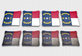 North Carolina State Flag Set themed specialty custom cornhole bags featuring a standard and worn / distressed flag.