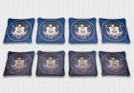 Utah State Flag Set themed specialty custom cornhole bags featuring a standard and worn / distressed flag.