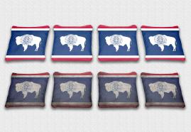 Wyoming State Flag Set themed specialty custom cornhole bags featuring a standard and worn / distressed flag.